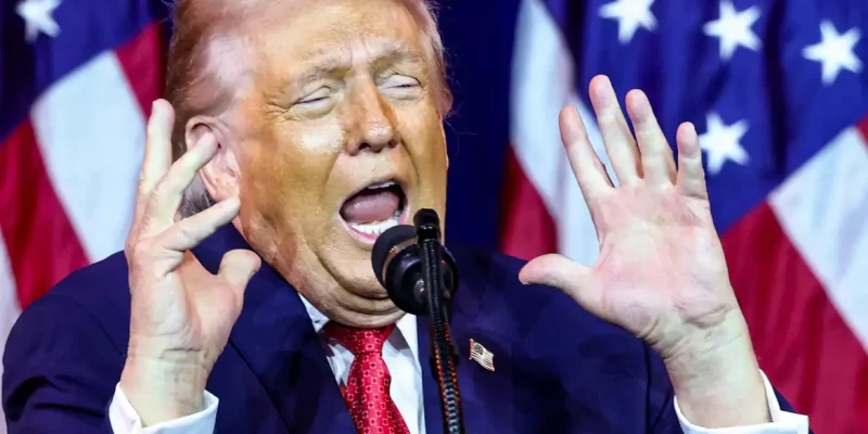 U.S. President Donald Trump gestures as he makes an impression of a transgender weightlifter during his address to House Republicans at their annual issues conference retreat at the Kennedy Center, renamed the Trump-Kennedy Center by the Trump-appointed board of directors, in Washington, D.C., U.S., January 6, 2026. REUTERS/Kevin Lamarque