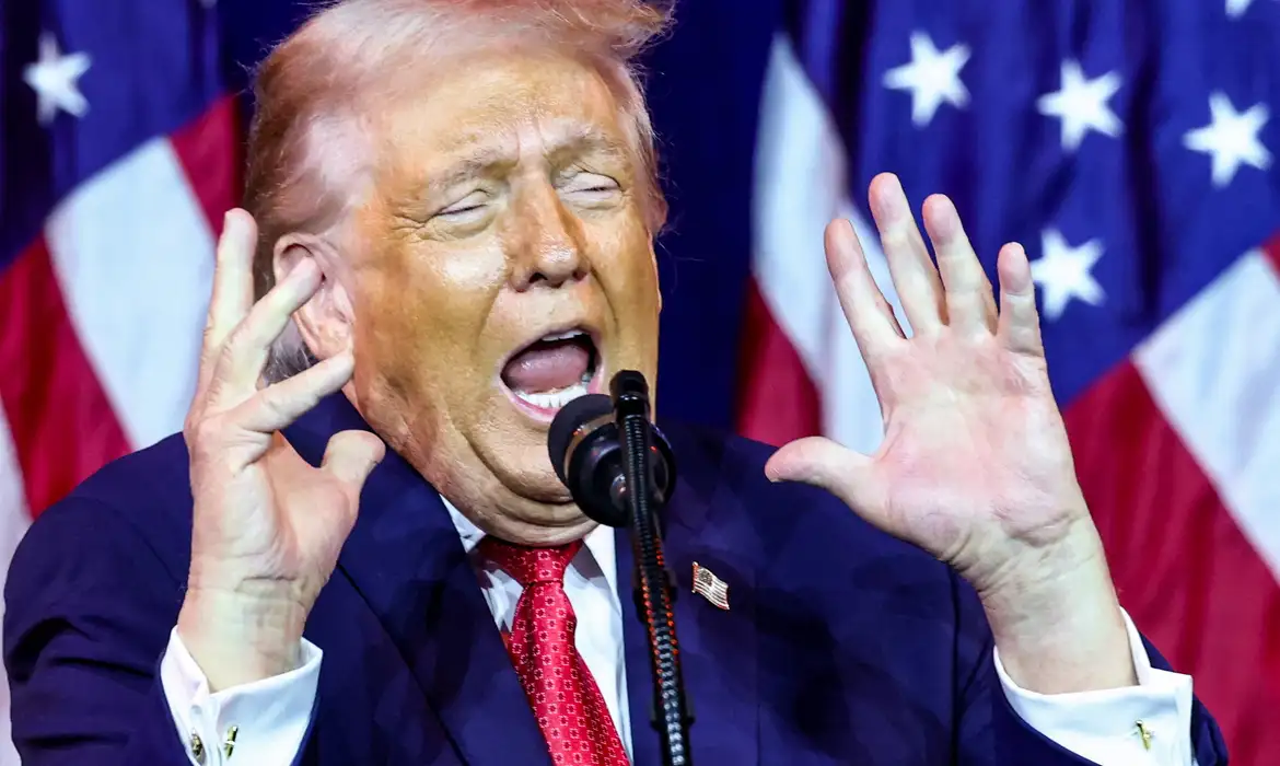 U.S. President Donald Trump gestures as he makes an impression of a transgender weightlifter during his address to House Republicans at their annual issues conference retreat at the Kennedy Center, renamed the Trump-Kennedy Center by the Trump-appointed board of directors, in Washington, D.C., U.S., January 6, 2026. REUTERS/Kevin Lamarque