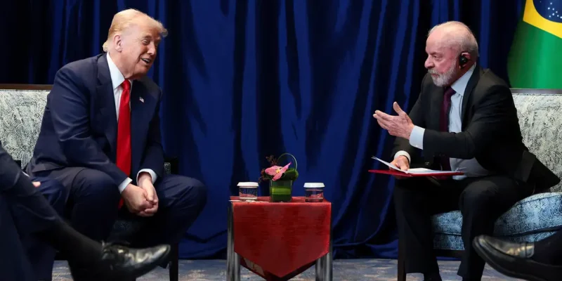 U.S. President Donald Trump and Brazilian President Luiz Inacio Lula da Silva talk as they meet on the sidelines of the 47th Association of Southeast Asian Nations (ASEAN) summit in Kuala Lumpur, Malaysia, October 26, 2025. REUTERS/Evelyn Hockstein