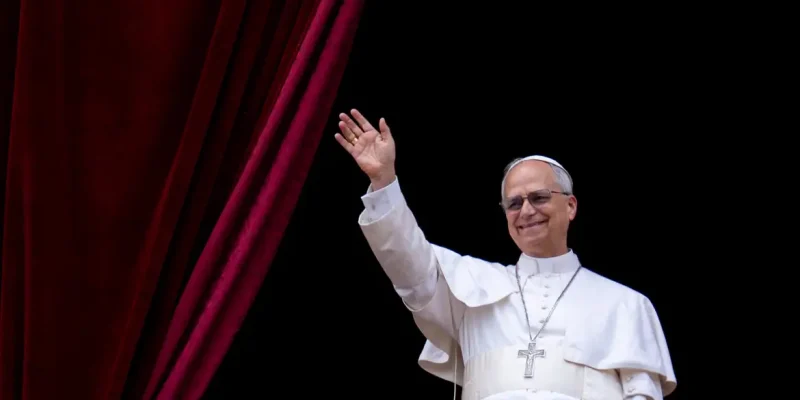 Pope Leo XIV waves to the crowd during the Regina Caeli prayer from the main central loggia of St. Peter's Basilica in The Vatican, on May 11, 2025 (Photo by Massimo Valicchia/NurPhoto).NO USE FRANCE