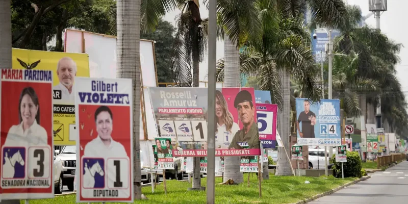 FILE PHOTO: Political advertising is on display ahead of the April 12 general election, in Lima, Peru, April 8, 2026. REUTERS/Angela Ponce/File Photo