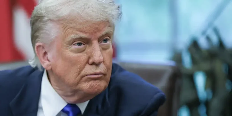 FILE PHOTO: U.S. President Donald Trump looks on as he signs executive orders and proclamations in the Oval Office at the White House, in Washington, D.C., U.S., May 5, 2025. REUTERS/Leah Millis/File Photo