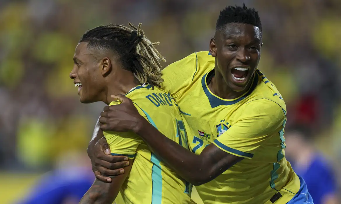 Mar 31, 2026; Orlando, Florida, USA; Brazil midfielder Danilo (18) reacts with forward Luiz Henrique (20) after scoring a goal against Croatia in the first half during an international friendly at Camping World Stadium. Mandatory Credit: Nathan Ray Seebeck-Imagn Images