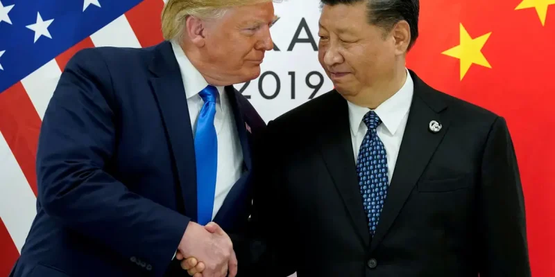 FILE PHOTO: FILE PHOTO: U.S. President Donald Trump meets with China's President Xi Jinping at the start of their bilateral meeting at the G20 leaders summit in Osaka, Japan, June 29, 2019. REUTERS/Kevin Lamarque/File Photo/File Photo