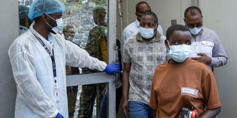 Bahati Erasto Musanga, provincial Governor walks with other officials, as they leave the Rodolphe Merieux Laboratory, National Biomedical Research Institute (INRB), where samples from suspected Ebola cases are examined, as part of the response to the epidemic in Goma, North Kivu province of the Democratic Republic of Congo, May 19, 2026. REUTERS/Arlette Bashizi