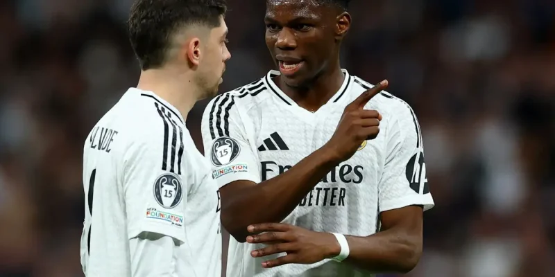 FILE PHOTO: Soccer Football - Champions League - Knockout Phase Playoff - Second Leg - Real Madrid v Manchester City - Santiago Bernabeu, Madrid, Spain - February 19, 2025 Real Madrid's Federico Valverde and Aurelien Tchouameni Action Images via Reuters/Matthew Childs/File Photo