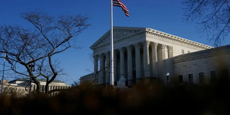 FILE PHOTO: A general view of U.S. Supreme Court as justices could issue at least one ruling in several major cases pending including a decision on the legality of President Donald Trump's sweeping global tariffs, in Washington, D.C., U.S., January 20, 2026.  REUTERS/Nathan Howard     REFILE - CORRECTING