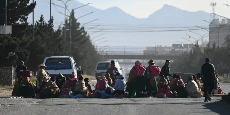 People block one of the entrances to the city of La Paz while demanding the resignation of President Rodrigo Paz amid an ongoing economic and fuel crisis, in El Alto, Bolivia, May 11, 2026. REUTERS/Claudia Morales