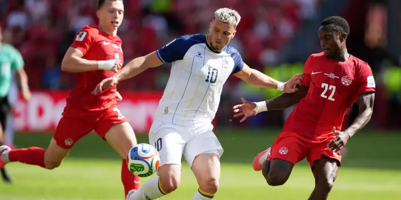 Soccer Football - FIFA World Cup 2026 - Group B - Canada v Bosnia and Herzegovina - Toronto Stadium, Toronto, Canada - June 12, 2026 Bosnia and Herzegovina's Ermedin Demirovic in action with Canada's Richie Laryea and Alistair Johnston IMAGN IMAGES via Reuters/John Sokolowski