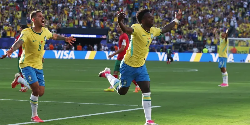 Soccer Football - FIFA World Cup 2026 - Group C - Brazil v Morocco - New York/New Jersey Stadium, East Rutherford, New Jersey, U.S. - June 13, 2026 Brazil's Vinicius Junior celebrates scoring their first goal with Bruno Guimaraes IMAGN IMAGES via Reuters/Vincent Carchietta