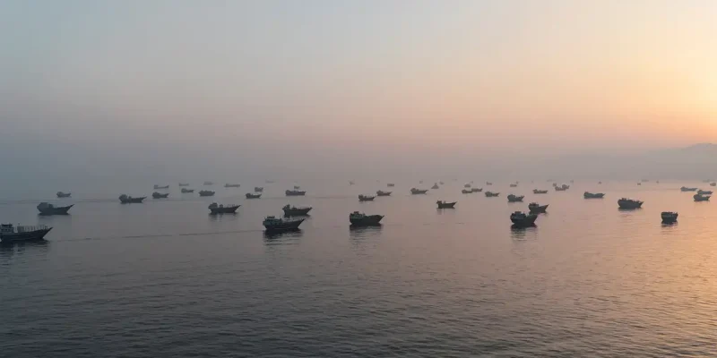 FILE PHOTO: A drone view shows vessels in the Strait of Hormuz, as seen from Musandam, Oman, June 15, 2026. REUTERS/Stringer/File Photo