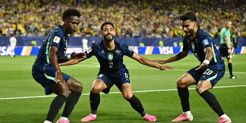 Soccer Football - FIFA World Cup 2026 - Group C - Brazil v Haiti - Philadelphia Stadium, Philadelphia, Pennsylvania, U.S. - June 19, 2026 Brazil's Matheus Cunha celebrates scoring their second goal with Vinicius Junior and Lucas Paqueta REUTERS/Dylan Martinez