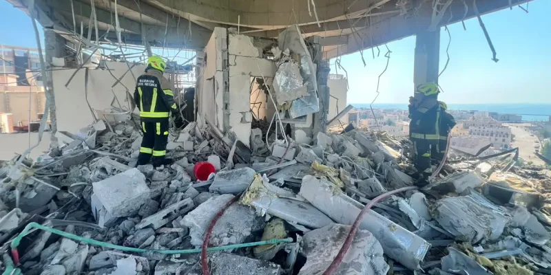 Bahrain civil defence and rescue personnel work in a residential building, which according to the Bahraini Interior Ministry, was hit by an Iranian drone, in Muharraq, Bahrain, June 28, 2026. Bahrain Police Media/Handout via REUTERS