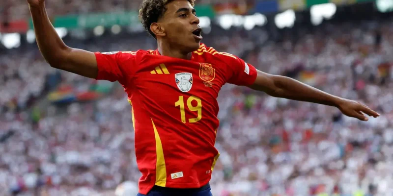 FILE PHOTO: Soccer Football - Euro 2024 - Quarter Final - Spain v Germany - Stuttgart Arena, Stuttgart, Germany - July 5, 2024 Spain's Lamine Yamal celebrates after Dani Olmo scores their first goal REUTERS/Heiko Becker/File Photo
