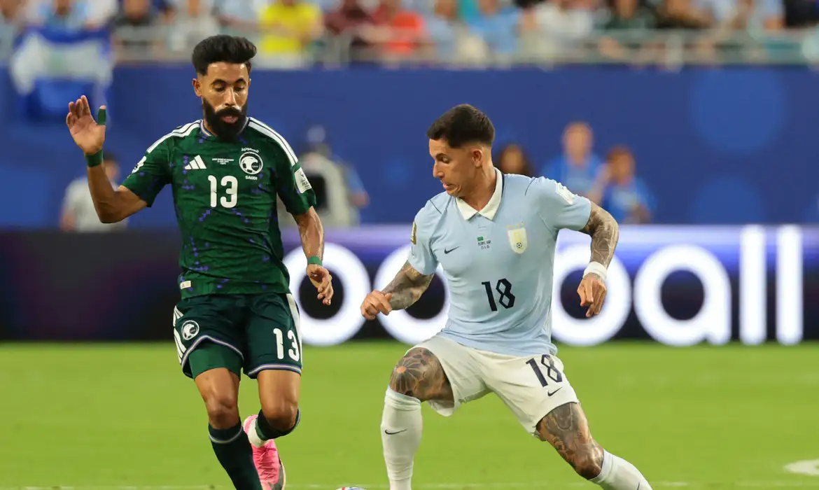 Soccer Football - FIFA World Cup 2026 - Group H - Saudi Arabia v Uruguay - Miami Stadium, Miami Gardens, Florida, U.S. - June 15, 2026 Uruguay's Brian Rodriguez in action with Saudi Arabia's Nawaf Bu Washl IMAGN IMAGES via Reuters/Sam Navarro