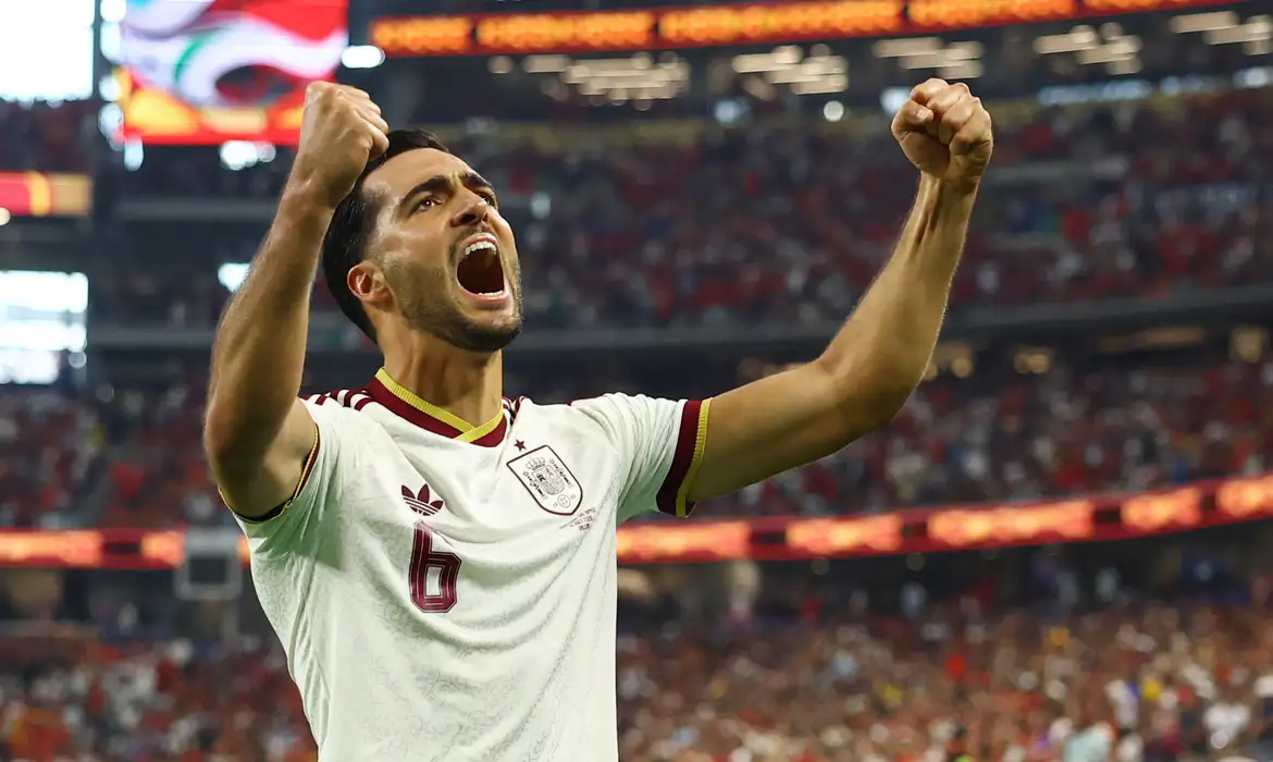 Soccer Football - FIFA World Cup 2026 - Round of 16 - Portugal v Spain - Dallas Stadium, Arlington, Texas, U.S. - July 6, 2026 Spain's Mikel Merino celebrates scoring their first goal REUTERS/Kai Pfaffenbach