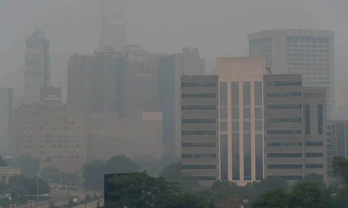 Smoke from active wildfires in Ontario, Canada and northern Minnesota obscures the downtown Detroit skyline on Thursday, July 16, 2026.