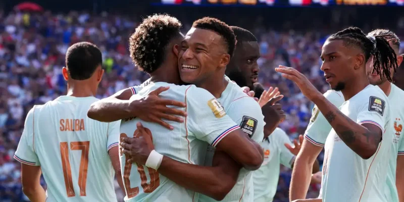 Soccer Football - FIFA World Cup 2026 - Quarter Final - France v Morocco - Boston Stadium, Foxborough, Massachusetts, U.S. - July 9, 2026 France's Kylian Mbappe celebrates scoring their first goal with Desire Doue and Michael Olise IMAGN IMAGES via Reuters/David Butler Ii