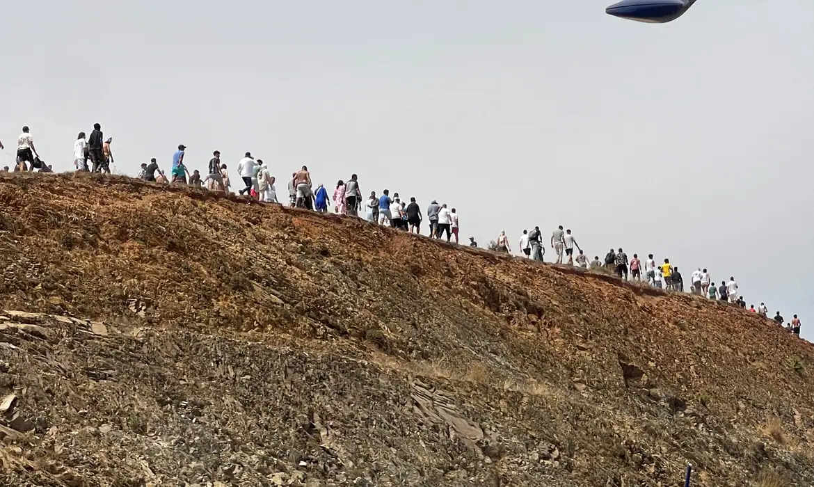 Migrants cross on foot into the North African enclave of Ceuta from Morocco by attemping to swim, according to Spain's Guardia Civil, near the border with Ceuta, in Fnideq, Morocco, July 30, 2026, in this still image obtained by REUTERS. THIS IMAGE HAS BEEN SUPPLIED BY A THIRD PARTY.   VERIFICATION: - Buildings, coastline and road layout matched satellite and archive imagery. - Coordinates: 35.85783579352456, -5.346942135788912. - Date verified by original file metadata.